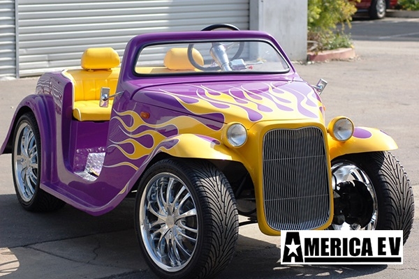 Purple California Roadster with Yellow Flames affordable golf cart rental, golf cart rent irving golf cart rental