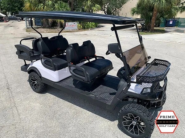 White Aluma 6 Passenger Lifted Golf Cart affordable golf cart rental, golf cart rent irving golf cart rental