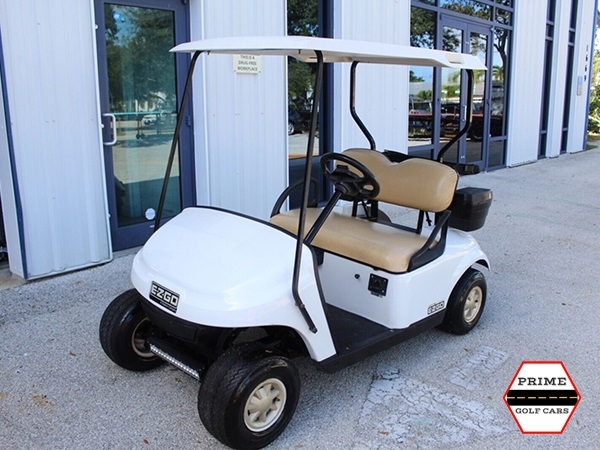 White EZGO 2 Passenger Golf Cart affordable golf cart rental, golf cart rent irving golf cart rental