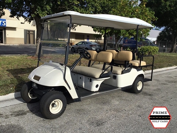 White EZGO 6 Passenger Golf Cart affordable golf cart rental, golf cart rent irving golf cart rental